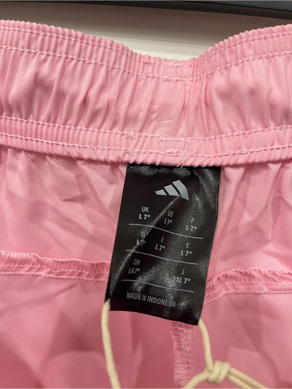 adidas Pink Athletic Shorts with Black Stripe Detail